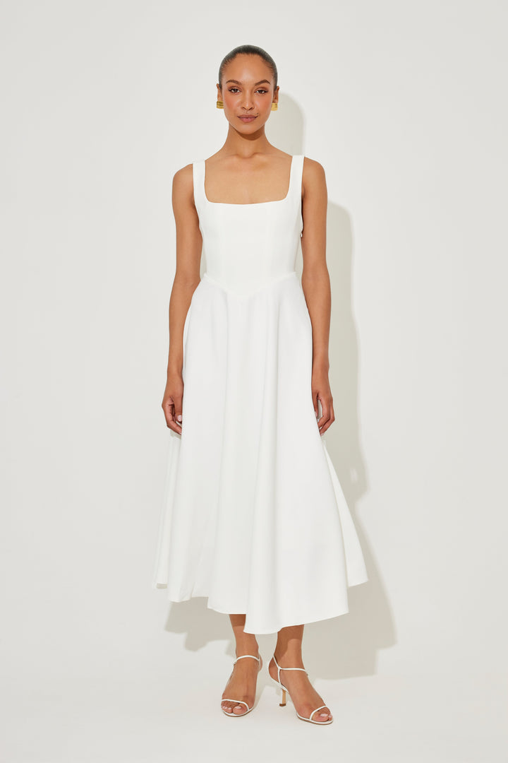 White sleeveless midi flow dress with square neckline and tiered skirt