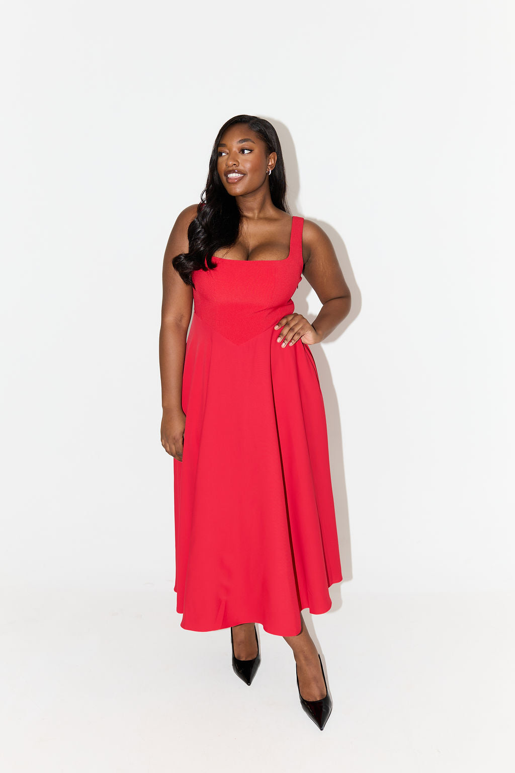 Red midi flow dress with square neckline, sleeveless bodice, and A-line hem