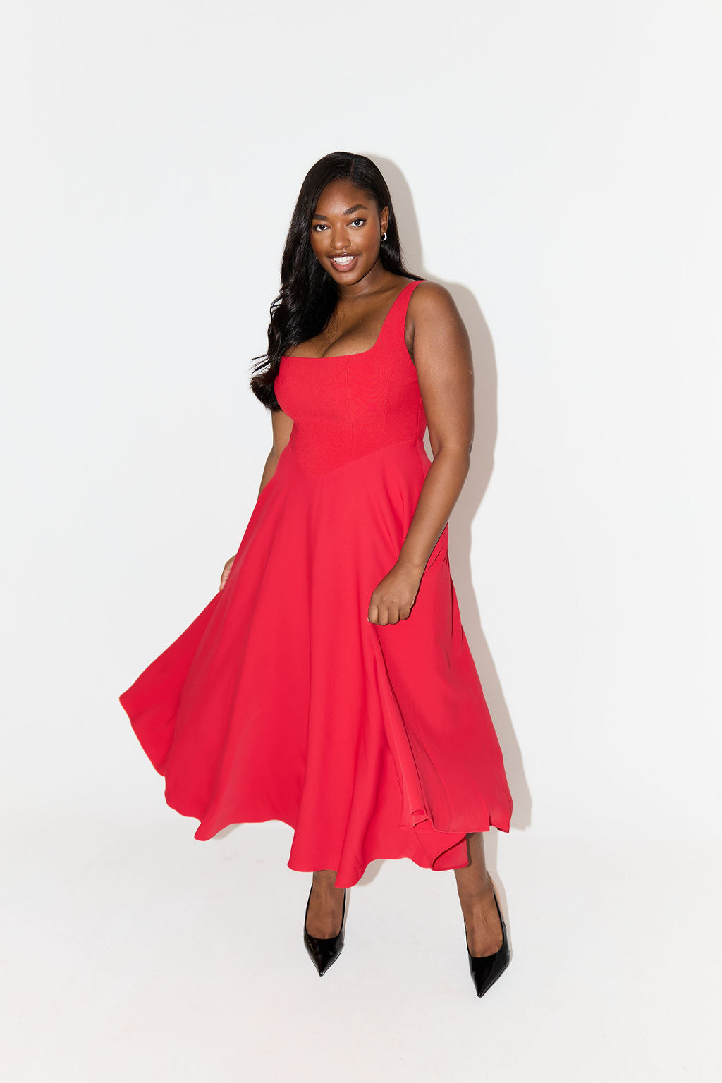 Red sleeveless midi flow dress with square neckline and flared skirt