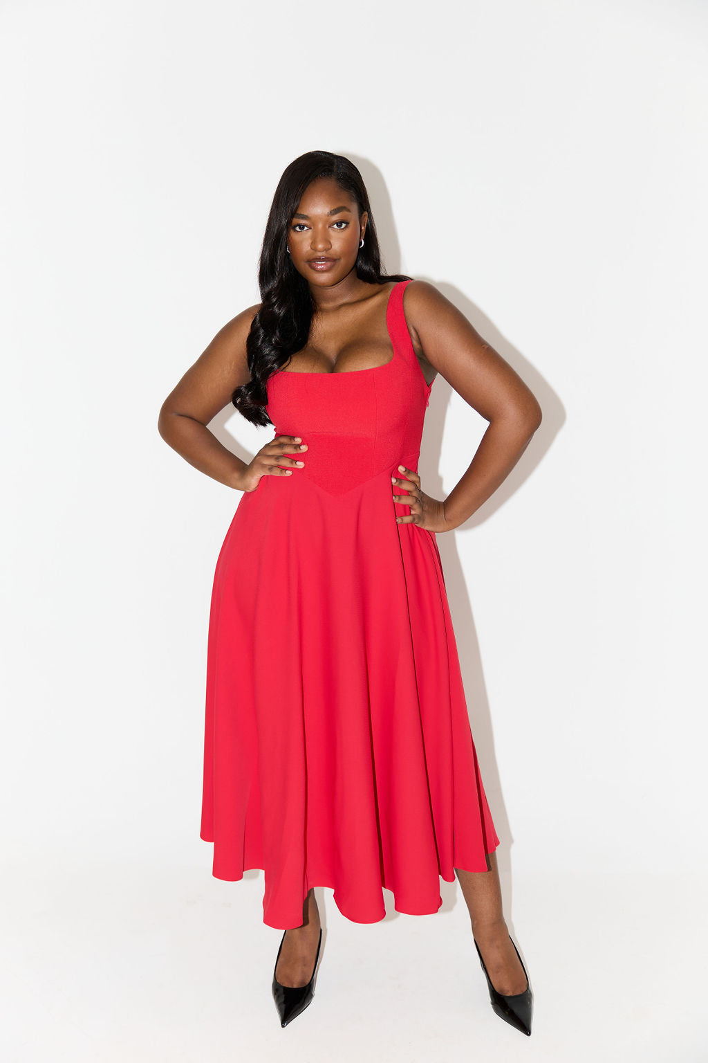 Red sleeveless midi flow dress with square neckline and gathered waist