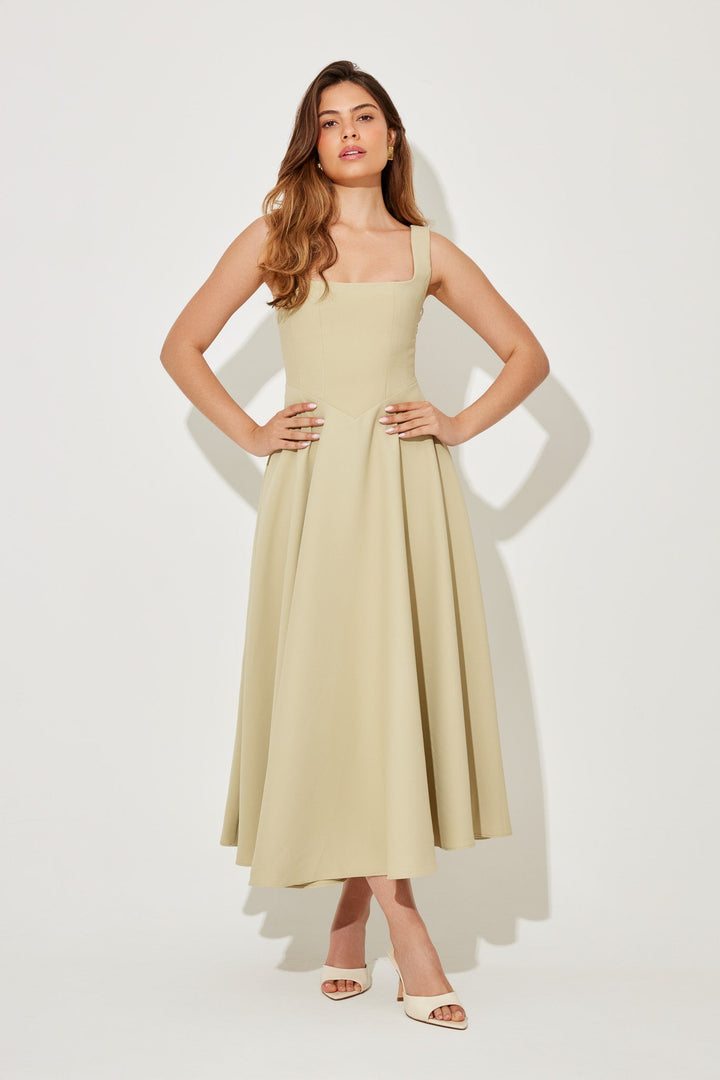 Cream sleeveless midi flow dress with square neckline and pleated skirt