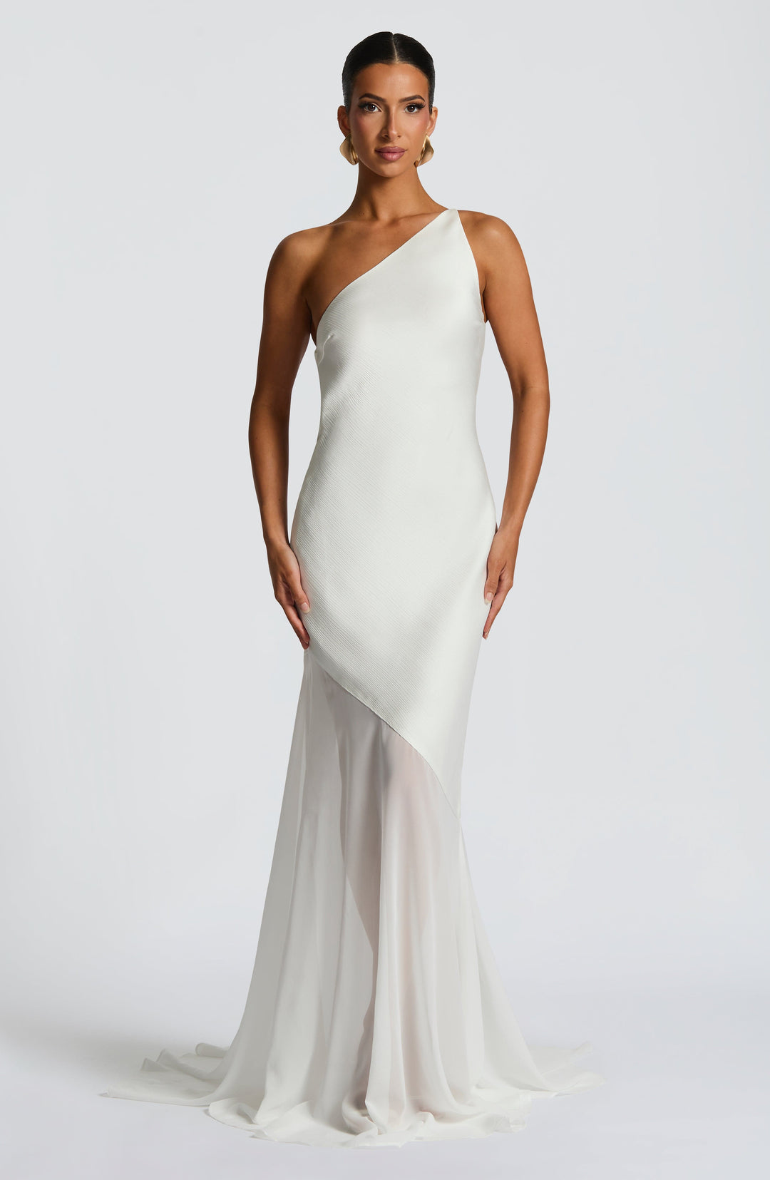 Ivory one-shoulder evening gown with sleek silhouette and soft flowing hem