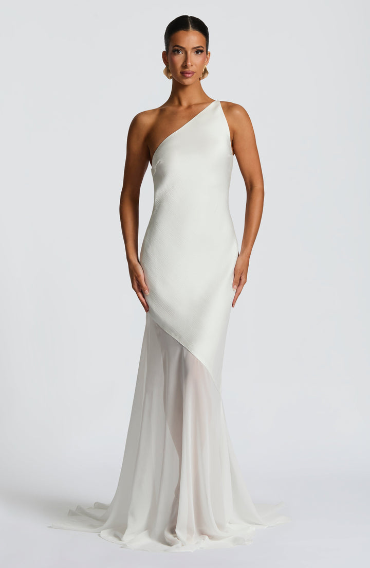 Ivory one-shoulder evening gown with sleek silhouette and soft flowing hem