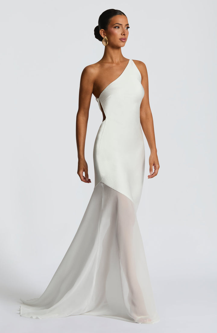 Ivory one-shoulder evening gown with fitted bodice and soft sheer train