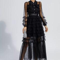 Black tiered maxi dress with sheer polka-dot sleeves and button front, belted waist
