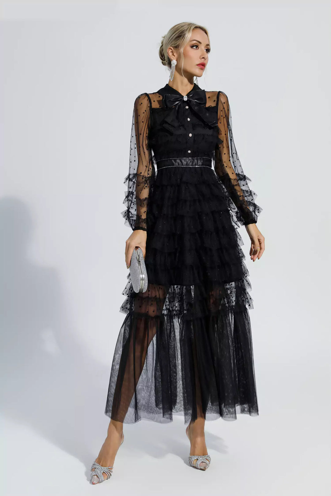 Black tiered maxi dress with sheer polka-dot sleeves and button front, belted waist