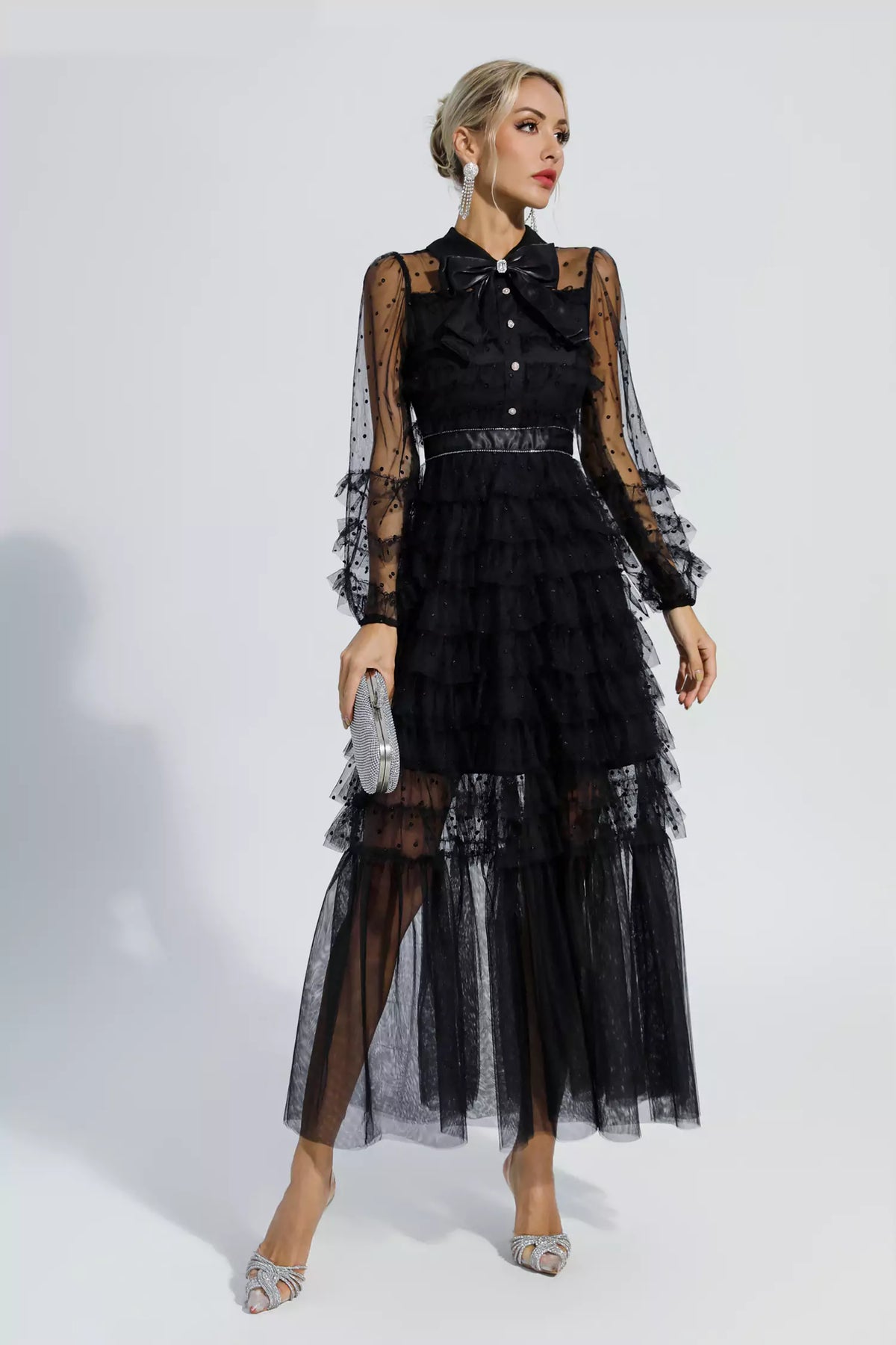 Black tiered maxi dress with sheer polka-dot sleeves and button front, belted waist