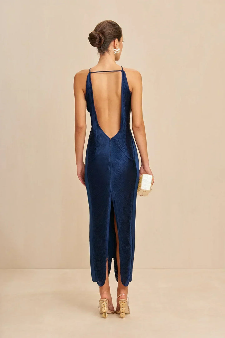 Ink blue backless halter day dress with draped back and long fringe hem