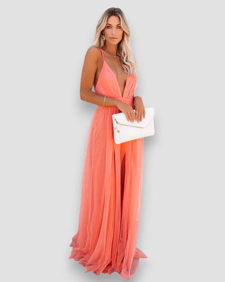 Peach halter maxi dress with V halter neckline and layered pleated tulle skirt