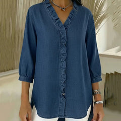 Dark blue denim blouse with 3/4 sleeves and ruffled button-front placket