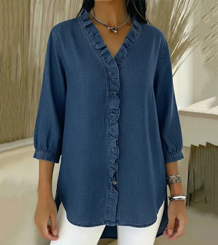 Dark blue denim blouse with 3/4 sleeves and ruffled button-front placket