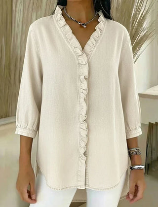 White fabric blouse with V-neck, ruffled button placket, 3/4 sleeves