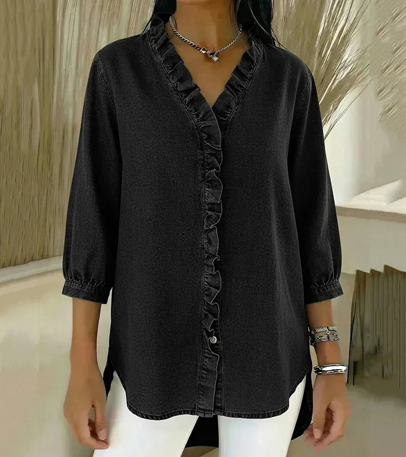 Black denim blouse with ruffled V-neck and button-front placket, three-quarter sleeves