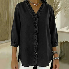Black denim blouse with 3/4 sleeves and ruffled button-front placket
