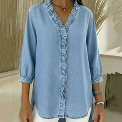 Light blue denim blouse with V-neck, ruffled button placket, 3/4 sleeves