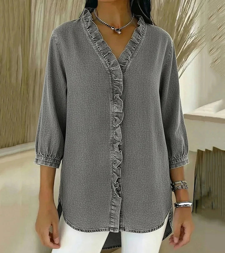 Gray denim blouse with V-neck and ruffled button front, 3/4 sleeves