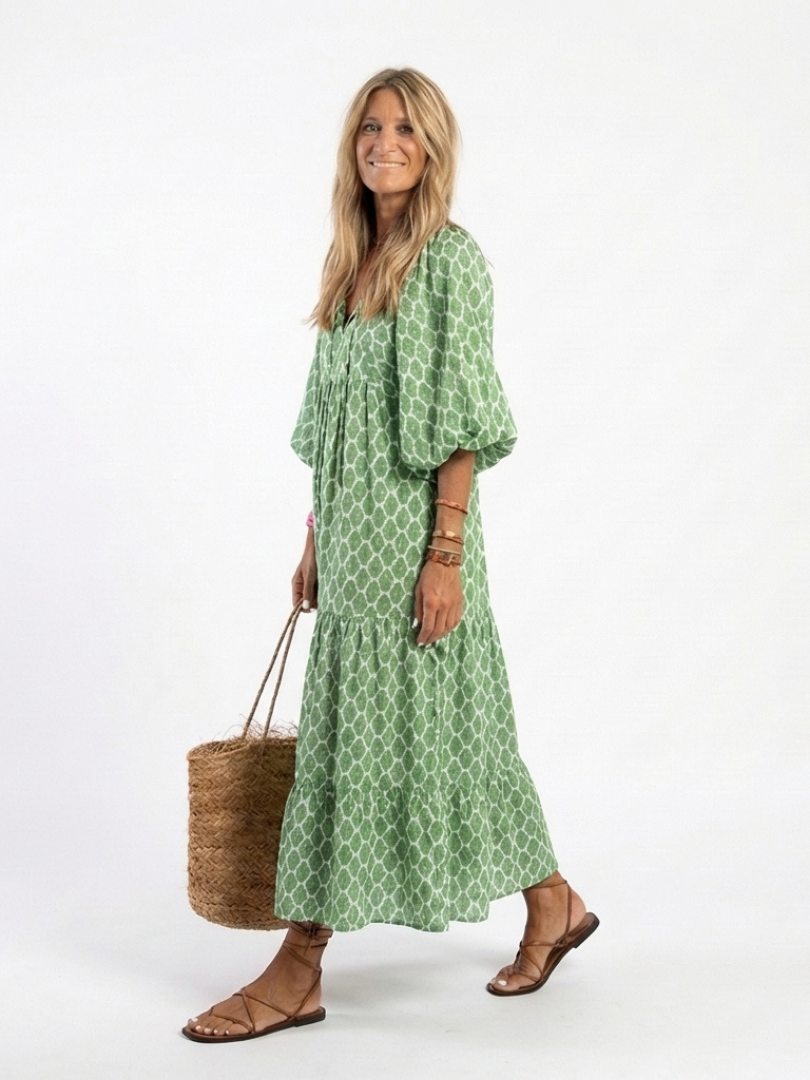 Green patterned midi dress with V-neck, three-quarter puff sleeves, flowy skirt