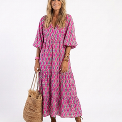 Purple patterned midi dress with V-neck and three-quarter puff sleeves, loose fit