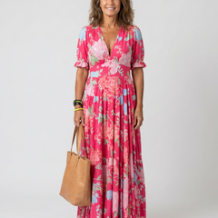 Pink floral midi dress with V-neck, short sleeves, tiered flowy skirt