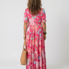 Pink floral midi dress with V-back, short puff sleeves, gathered waist, tiered hem