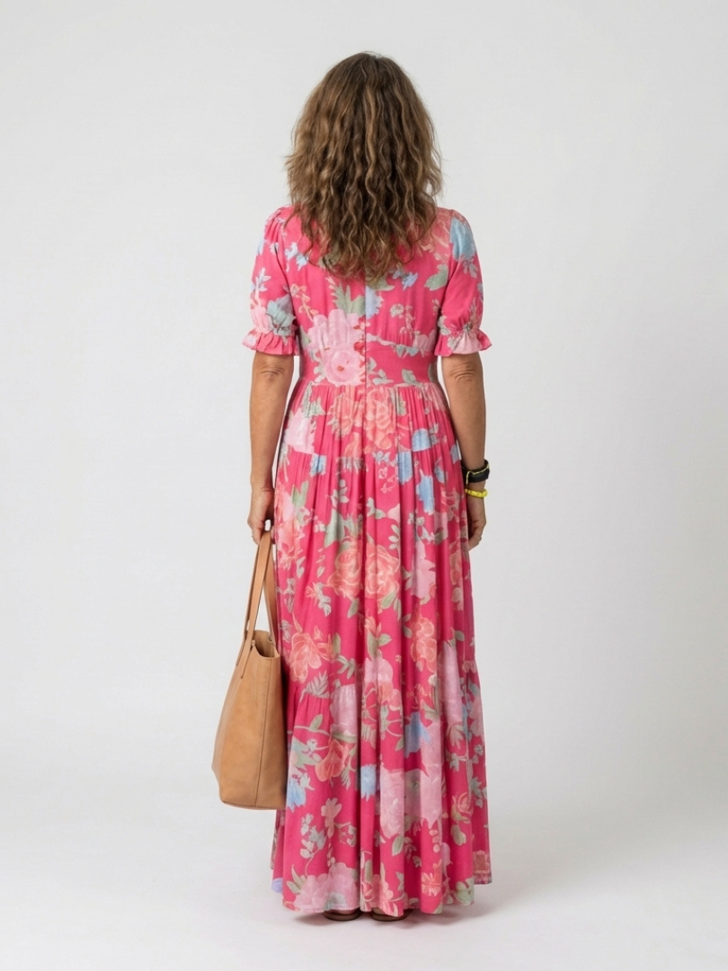 Pink floral midi dress with V-back, short puff sleeves, gathered waist, tiered hem