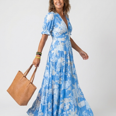 Blue floral midi dress with V-neck, short puff sleeves, elasticized waist, tiered skirt