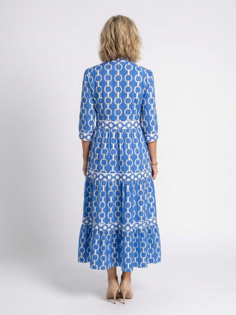 Blue chain-pattern three-quarter sleeve midi dress, back view