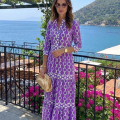 Purple chain-pattern three-quarter sleeve midi dress with tiered skirt, front view