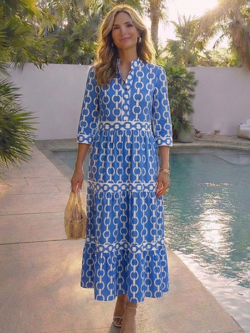 Blue chain-pattern three-quarter sleeve midi dress with tiered skirt, front view