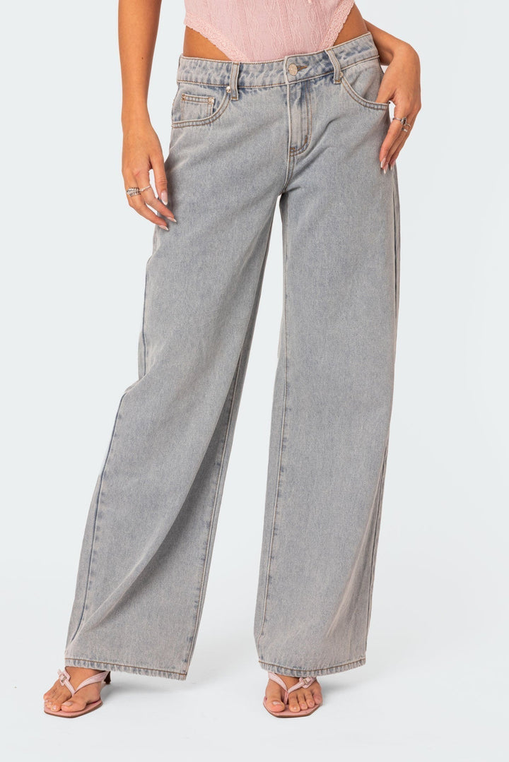 Light gray wide-leg jeans with contrast topstitching and front patch pockets