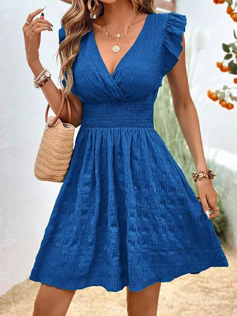 Blue V-neck summer dress with ruffled cap sleeves and gathered tiered skirt