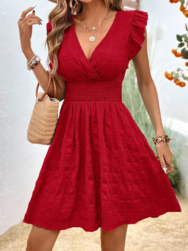 Red V-neck summer dress with ruffled cap sleeves and gathered tiered skirt
