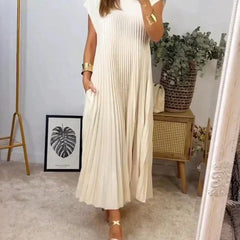 Beige sleeveless pleated maxi dress, crew neck and gathered skirt