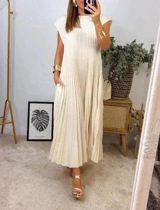 Beige sleeveless pleated maxi dress, crew neck and gathered skirt