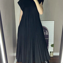 Black sleeveless pleated maxi dress with round neck and flowy tiers