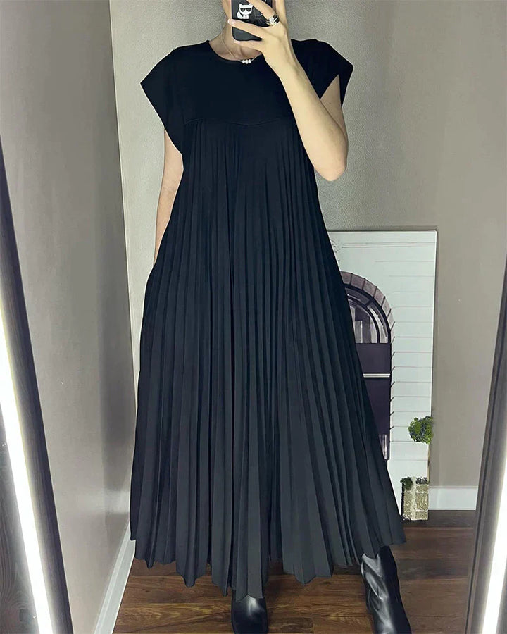 Black sleeveless pleated maxi dress with round neck and flowy tiers