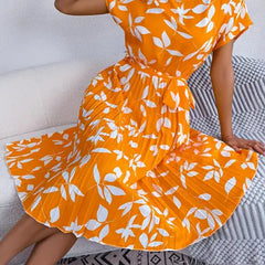Orange leaf print line dress with gathered waist and short puff sleeves