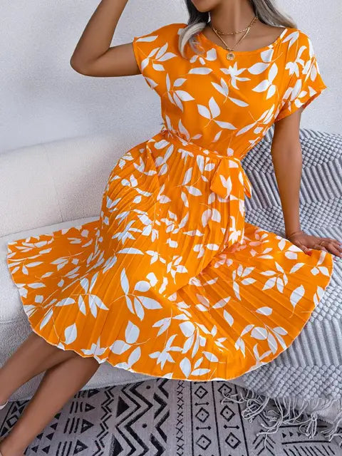 Orange leaf print line dress with gathered waist and short puff sleeves