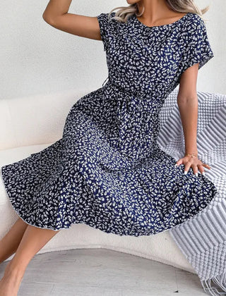 Dark navy floral midi line dress with short sleeves and pleated skirt