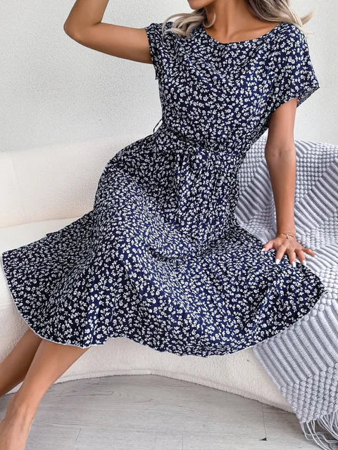 Dark navy floral midi line dress with short sleeves and pleated skirt