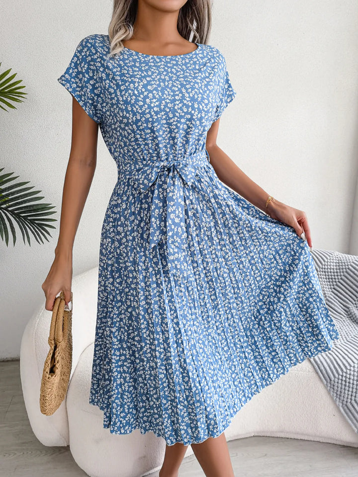 Blue floral midi line dress with short sleeves and gathered waist