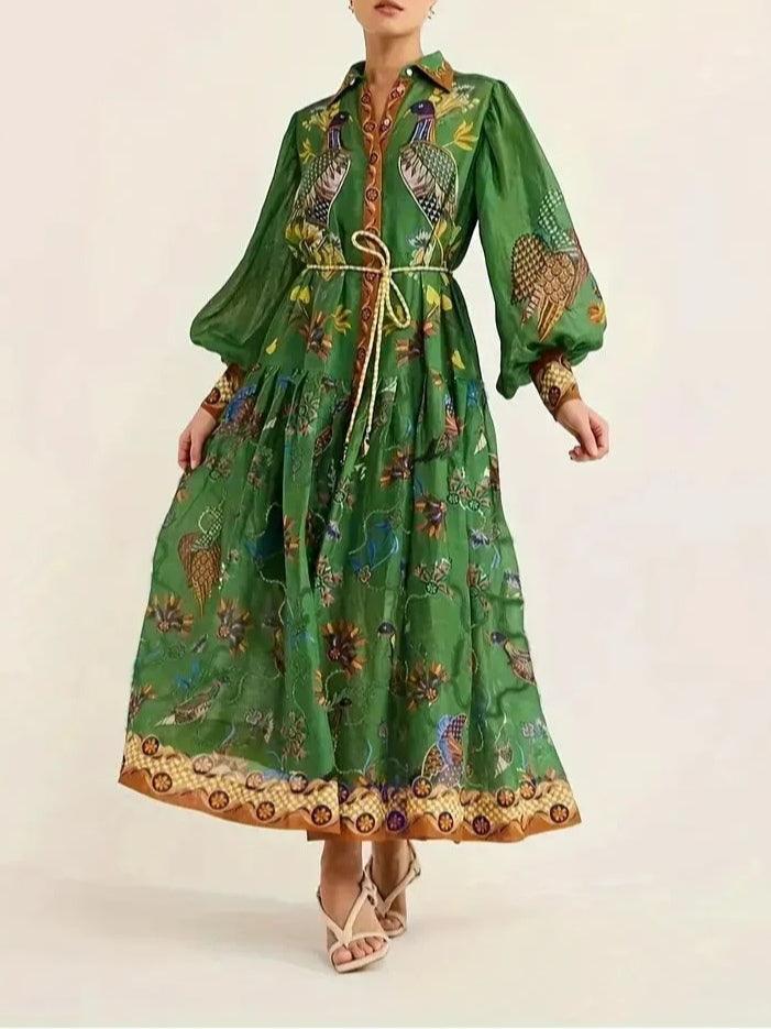 Green floral print maxi dress with puff sleeves, collar, and belt at waist