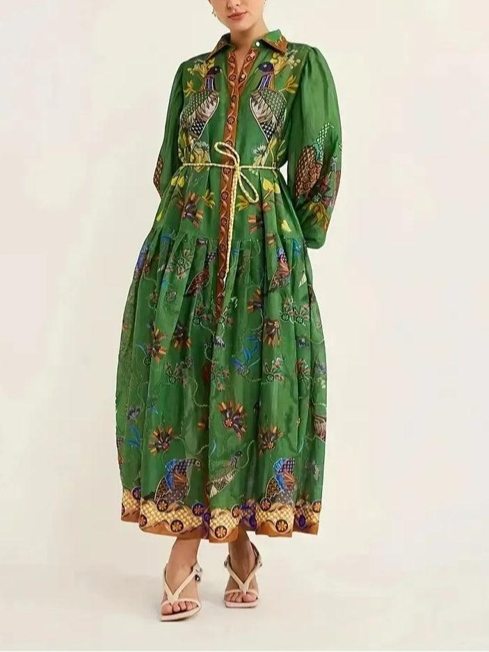 Green floral print maxi dress with long puff sleeves, V-collar, and tiered skirt