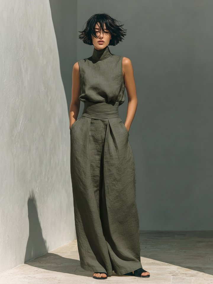Sleeveless high-neck dress with ruched waist belt and wide legs in army green