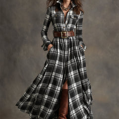 Belted shirt dress in black-and-white plaid with long sleeves and front slit