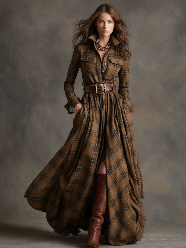 Belted shirt dress in brown plaid with long sleeves, button-front, and full skirt