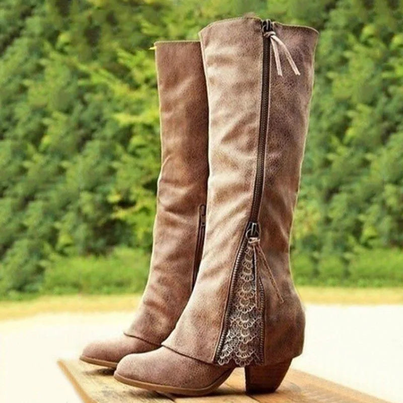 Brown knee-high boots with side zipper and decorative lace trim
