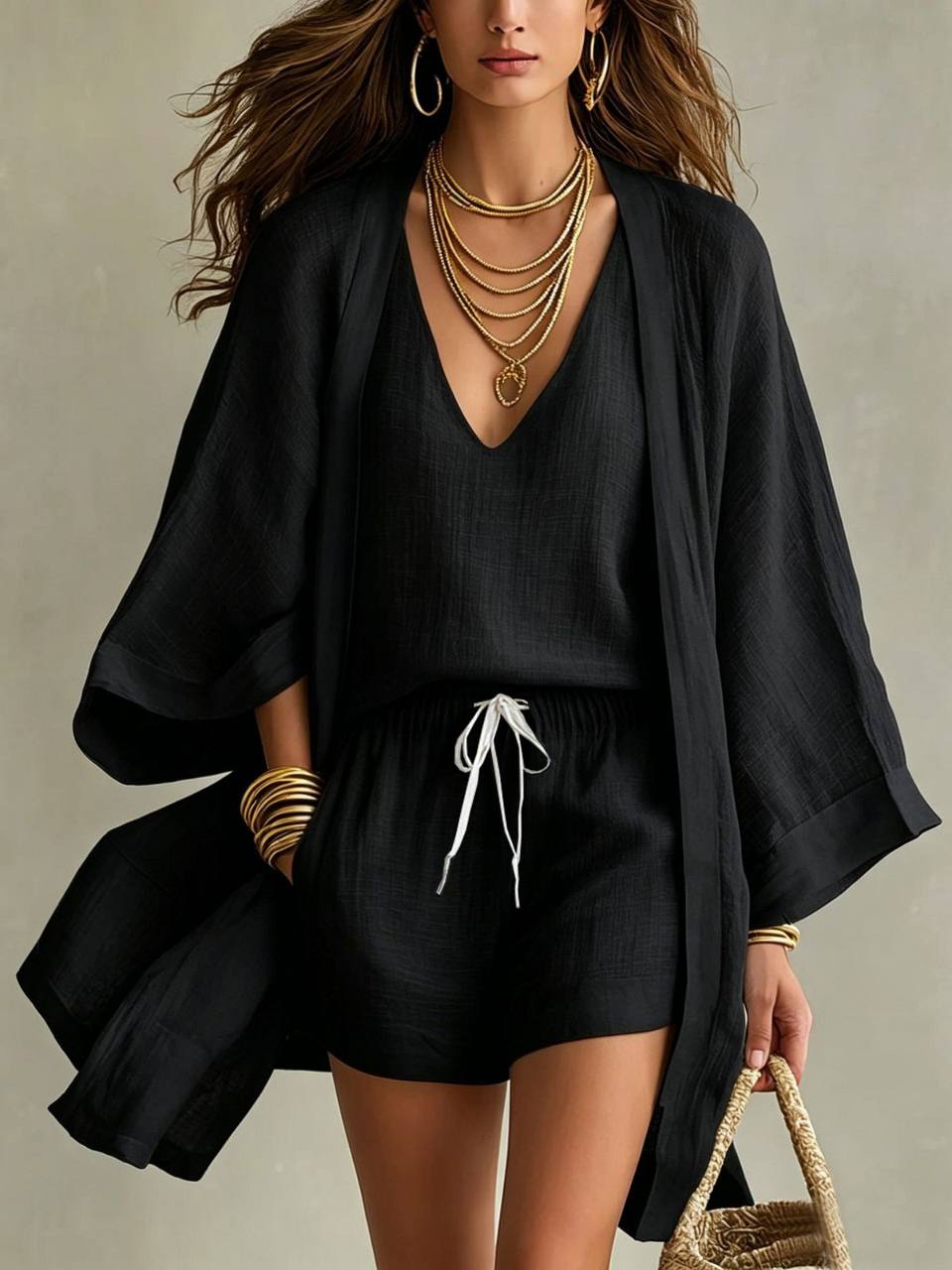 Black V-neck top and drawstring shorts with matching lightweight kimono-style cover-up