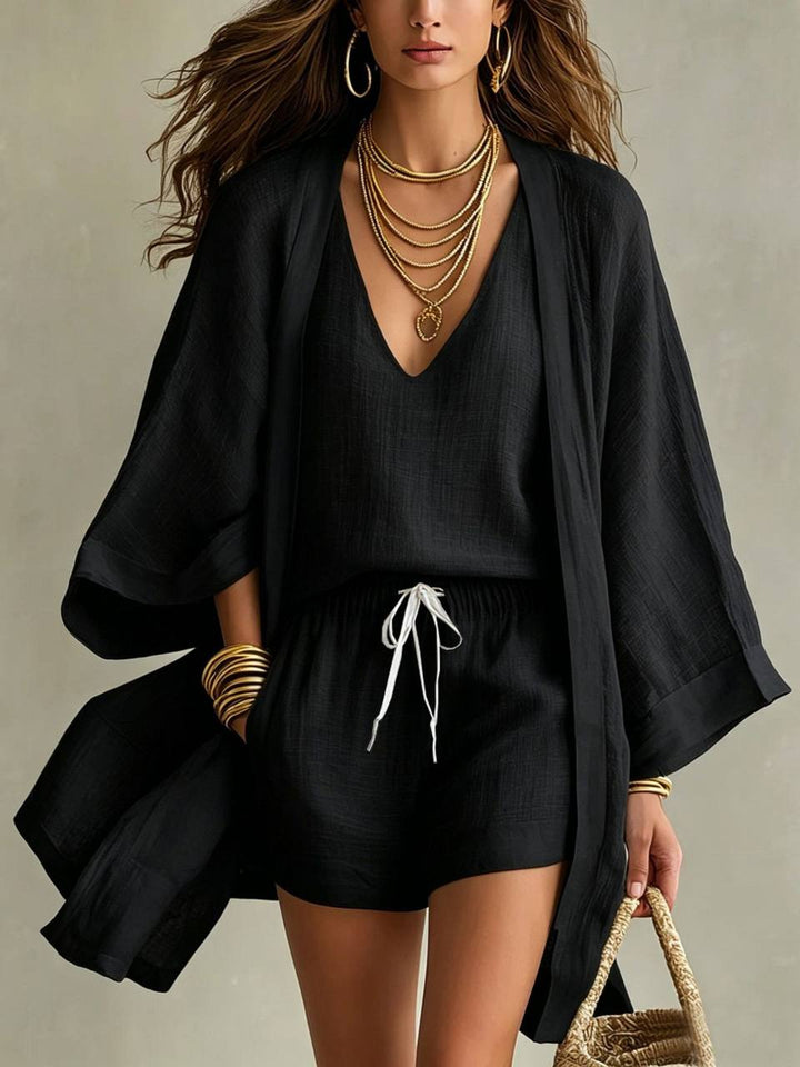 Black V-neck top and drawstring shorts with matching lightweight kimono-style cover-up
