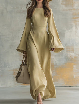 Elegant maxi dress in sand yellow, square neckline, flared bell sleeves, gathered waist